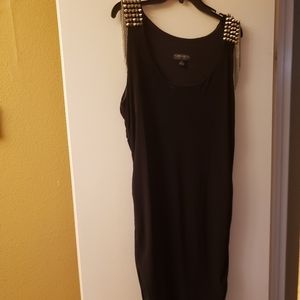 Black dress with studs and chains on shoulder